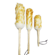 Household dedust brush of wool and wooden handle